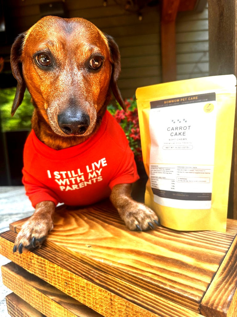 Ingredient facts and clean label layout for Bowwow Pet Care Carrot Cake treats, showing natural beet root and vanilla baking ingredients.